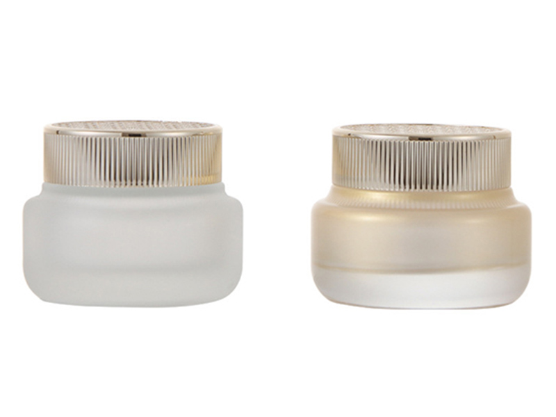 High-grade gold-capped glass cream jar